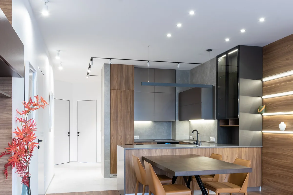 Modern ceiling and layered lighting in a contemporary interior